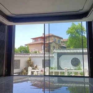 Custom Three-Track Four-Panel Exterior Glass Sliding Entry Door for Hotels and Villas
