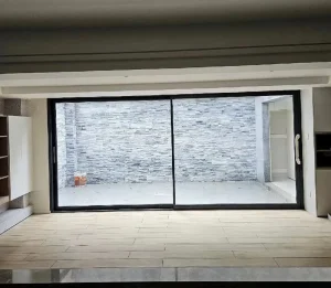 Manufacturer Direct Supply Exterior Entry Waterproof Glass Door with Large Handle, Low Track, Barrier-Free, Family-Friendly, Heavy-Duty
