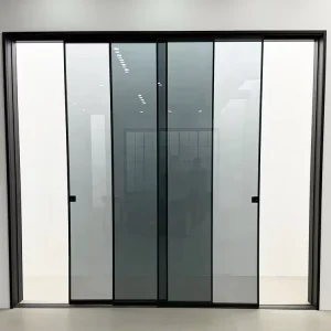 Narrow Aluminum-Frame Sliding Door System with Bottom Track, 3 Glass Panels, and Grey Glass