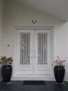 Patterned Wrought Iron Entry Door with Hand-Forged Craftsmanship and Weather-Resistant Finish