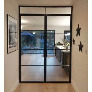 Traditional Victorian Iron French Door with Ornate Filigree Design and Double-Pane Glass for Exterior Garden Entry