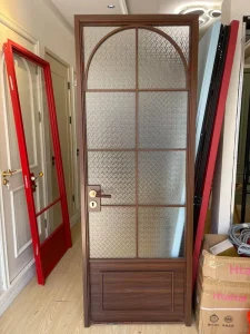New Retro-Style Titanium-Magnesium Alloy Swing Door with Yellow Walnut-Finish Frame for Bathrooms and Balconies