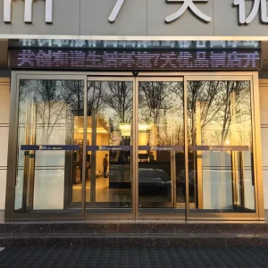 Tempered Glass Automatic Sliding Door with Stainless Steel Frame Windproof Minimalist Design for Hotel and Mall Use